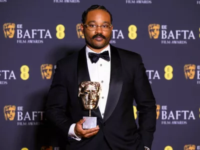 3DTM9RD London, UK. 22 February 2026. Ryan Coogler poses with the Original Screenplay Award for 'Sinners' during the 79th British Academy Film Awards, at the Royal Festival Hall, Southbank Centre, London. Photo credit should read: Matt Crossick/Alamy Live News