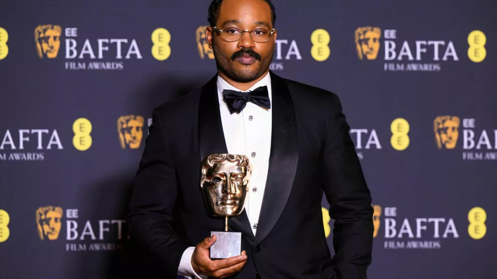 3DTM9RD London, UK. 22 February 2026. Ryan Coogler poses with the Original Screenplay Award for 'Sinners' during the 79th British Academy Film Awards, at the Royal Festival Hall, Southbank Centre, London. Photo credit should read: Matt Crossick/Alamy Live News