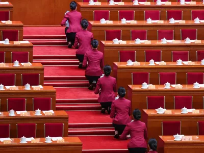 Attendants work ahead of the opening session of the Chinese People's Political Consultative Conference (CPPCC), at the Great Hall of the People in Beijing, China March 4, 2026. REUTERS/Maxim Shemetov
