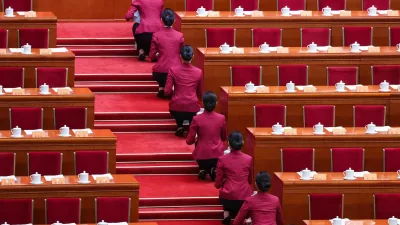 Attendants work ahead of the opening session of the Chinese People's Political Consultative Conference (CPPCC), at the Great Hall of the People in Beijing, China March 4, 2026. REUTERS/Maxim Shemetov