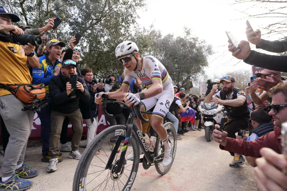 Tadej Pogacar of Team UAE Emirates pedals during the Strade Bianche (White Roads), a 203 km one day cycling race from and to Siena, Italy, Saturday March 7, 2026. (Fabio Ferrari/LaPresse via AP)