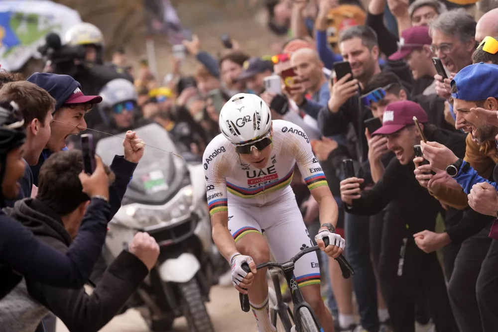 Tadej Pogacar of Team UAE Emirates pedals during the Strade Bianche (White Roads), a 203 km one day cycling race from and to Siena, Italy, Saturday March 7, 2026. (Fabio Ferrari/LaPresse via AP)