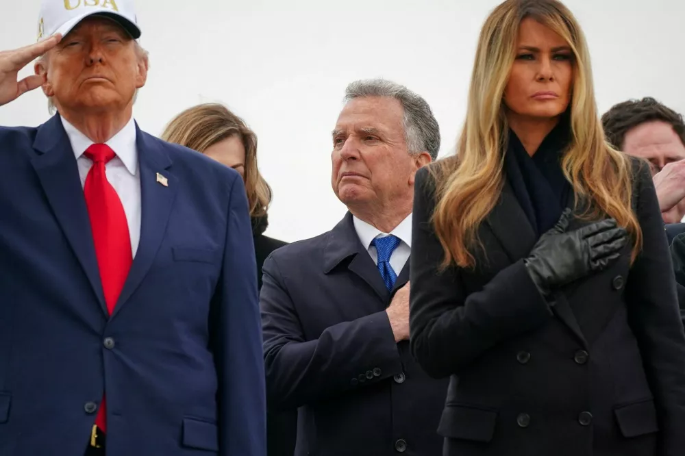 U.S. Special Envoy Steve&nbsp;Witkoff stands behind President Donald Trump and first lady Melania Trump during a dignified transfer of the remains of six U.S. Army service members of the 103rd Sustainment Command, who were killed in Kuwait, Major Jeffrey O'Brien, Capitain Cody Khork, Chief Warrant Officer 3 Robert Marzan, Sergeant 1st Class Nicole Amor, Sergeant 1st Class Noah Tietjens and Sergeant Declan Coady, amid the U.S.-Israeli conflict with Iran, at Dover Air Force Base in Dover, Delaware, U.S., March 7, 2026. REUTERS/Nathan Howard