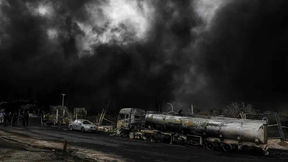 Smoke rises after a reported strike on Shahran fuel tanks, amid the U.S.-Israeli conflict with Iran, in Tehran, Iran, March 8, 2026. Majid Asgaripour/WANA (West Asia News Agency) via REUTERS ATTENTION EDITORS - THIS PICTURE WAS PROVIDED BY A THIRD PARTY   TPX IMAGES OF THE DAY