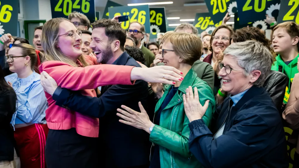 Britta Ha&szlig;elmann, from right, Chair of the B&uuml;ndnis 90/Die Gr&uuml;nen parliamentary group, Franziska Brantner, Federal Chair of B&uuml;ndnis 90/Die Gr&uuml;nen, Felix Banaszak, Federal Chair of B&uuml;ndnis 90/Die Gr&uuml;nen, and Katharina Dr&ouml;ge, Chair of the B&uuml;ndnis 90/Die Gr&uuml;nen parliamentary group, react to the first projections at the B&uuml;ndnis 90/Die Gr&uuml;nen election party at the party headquarters in Berlin, Germany, Sunday, March 8, 2026. (Christoph Soeder/dpa via AP)