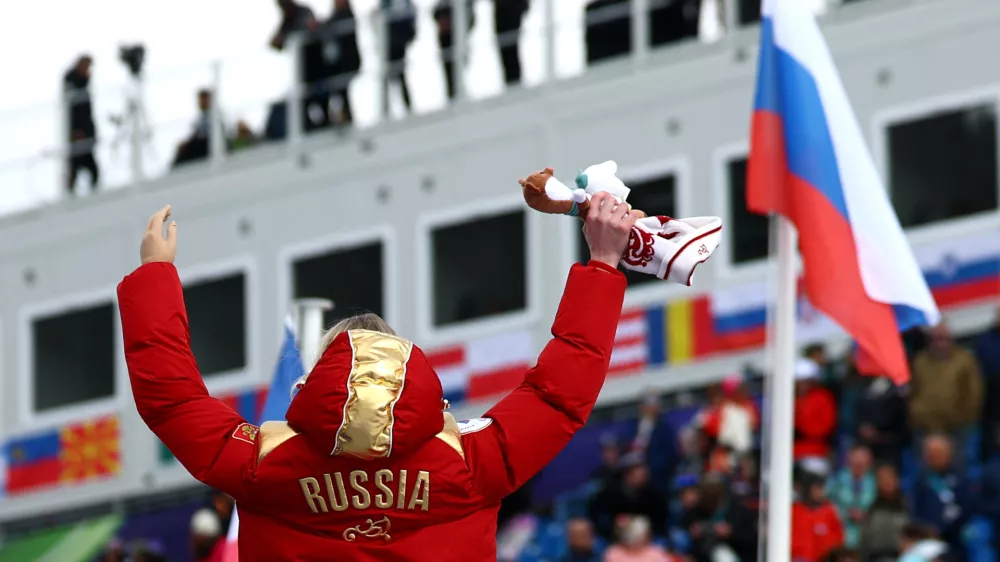 Milano Cortina 2026 Paralympics - Para Alpine Skiing - Women's Super-G Standing Victory Ceremony - Tofane Alpine Skiing Centre, Belluno, Italy - March 09, 2026. Gold medallist Varvara Voronchikhina of Russia celebrates on the podium during the women's super-g standing victory ceremony REUTERS/Lisi Niesner
