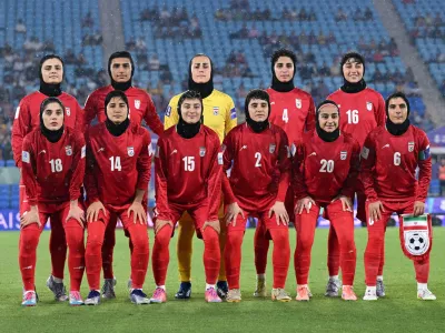 Iran players pose prior to the AFC Women's Asian Cup Group A match between Iran and Philippines at Gold Coast Stadium on the Gold Coast, Australia, March 8, 2026. Dave Hunt/AAP Image/via REUTERS  ATTENTION EDITORS - THIS IMAGE WAS PROVIDED BY A THIRD PARTY. NO RESALES. NO ARCHIVE. AUSTRALIA OUT. NEW ZEALAND OUT. NO COMMERCIAL OR EDITORIAL SALES IN NEW ZEALAND. NO COMMERCIAL OR EDITORIAL SALES IN AUSTRALIA. EDITORIAL USE ONLY.