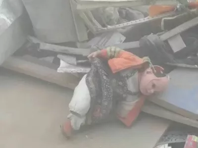 A damaged doll lies in the rubble of residential buildings after air strikes, in the Resalat neighborhood, in Tehran, Iran, in this screengrab obtained from a handout video released March 9, 2026. Iranian Red Crescent Society/Handout via REUTERS THIS IMAGE HAS BEEN SUPPLIED BY A THIRD PARTY. MANDATORY CREDIT. NO RESALES. NO ARCHIVES. Verification Lines: Road layout, building exterior and trees matched satellite imagery Coordinates of the damaged buildings: 35.73951256658418, 51.48752698828381 Date not verified but no older version of the video was found posted online before March 9. Local media reported that residential buildings in Resalat neighborhood got hit during air strikes on March 9