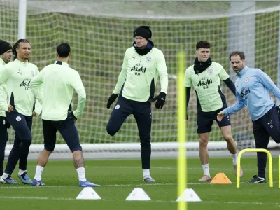 Soccer Football - UEFA Champions League - Manchester City Training - Etihad Campus, Manchester, Britain - March 10, 2026 Manchester City's Erling Haaland, Phil Foden and Nathan Ake during training Action Images via Reuters/Jason Cairnduff