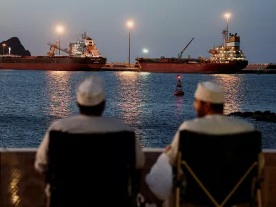 The Galaxy Globe bulk carrier and the Luojiashan tanker sit anchored as Iran vows to close the Strait of Hormuz, amid the U.S.-Israeli conflict with Iran, in Muscat, Oman, March 9, 2026. REUTERS/Benoit Tessier   TPX IMAGES OF THE DAY
