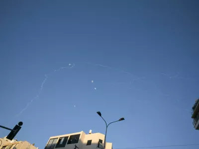 Vapour trails in the sky after Israel intercepted projectiles launched from Lebanon, amid an escalation between Hezbollah and Israel, and amid the U.S.-Israeli conflict with Iran, as seen from Tel Aviv, Israel March 9, 2026. REUTERS/Dylan Martinez