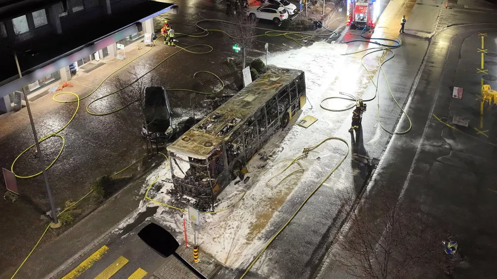 Emergency personnel work at the site of a deadly bus fire in Kerzers, Switzerland, March 10, 2026. STATE OF FREIBURG/Handout via REUTERS  THIS IMAGE HAS BEEN SUPPLIED BY A THIRD PARTY. NO RESALES. NO ARCHIVES. MANDATORY CREDIT. SELECTIVE BLURRING FROM SOURCE.