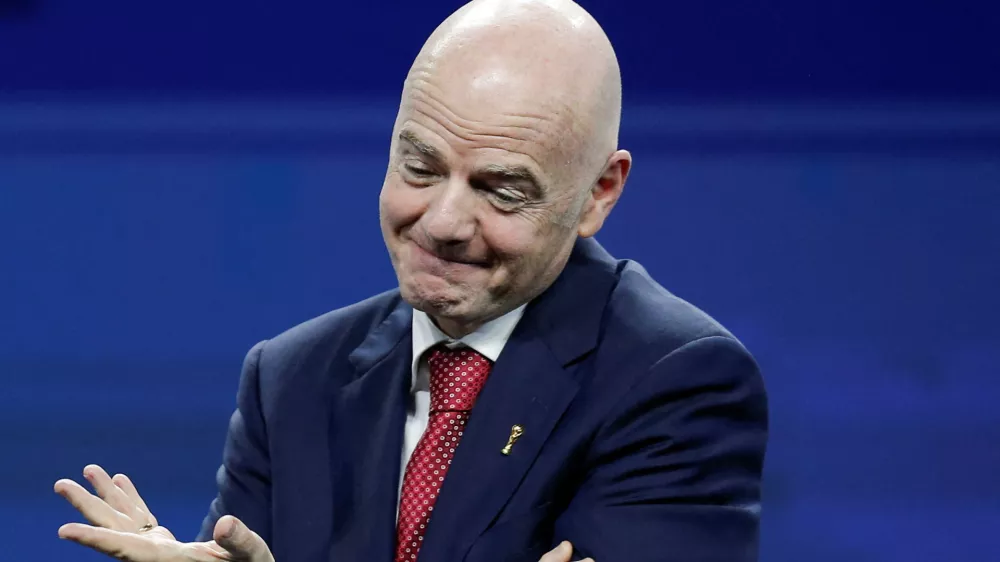 FIFA President Gianni Infantino reacts on stage during a gala celebrating Conmebol's President Alejandro Dominguez's 10th anniversary as head of the organization, in Asuncion, Paraguay, January 26, 2026. REUTERS/Cesar Olmedo