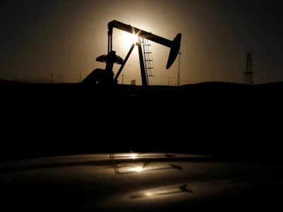 FILE PHOTO: A pump jack is seen at sunrise near Bakersfield, California October 14, 2014. REUTERS/Lucy Nicholson/File Photo/File Photo