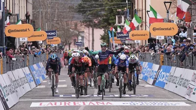 Denmark's Tobias Lund Andresen celebrates as he crosse the finish line to win the third stage of the Tirreno-Adriatico cycling race from Cortona to Magliano de' Marsi, Italy, Wednesday, March 11, 2026. (Marco Alpozzi/LaPresse via AP)