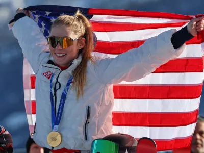 United States' Mikaela Shiffrin celebrates winning the gold medal of the alpine ski, women's slalom race, at the 2026 Winter Olympics, in Cortina d'Ampezzo, Italy, Wednesday, Feb. 18, 2026. (AP Photo/Marco Trovati)