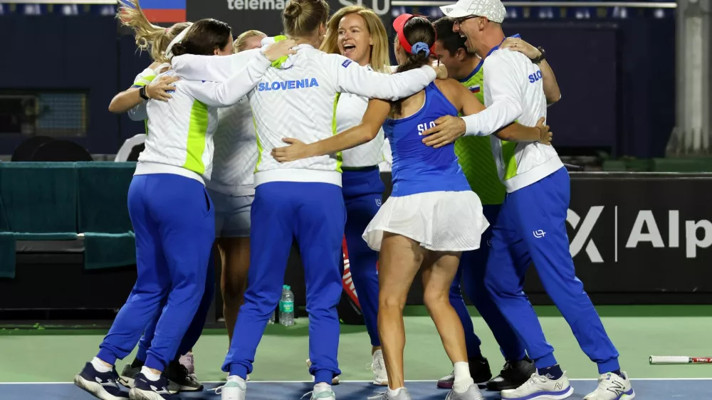 Slovenia team members celebrate Kaja Juvan Slovenia Match win during 2nd Match of 2025 Billie jean king cup play-off between the India vs Netherlands vs Slovenia held at the s.m. Krishna tennis stadium in Bangalore, India on the 15th November 2025Slovenija, tenis, Indija, pokal Billie Jean King, slavjePhoto by Rahul Goyal / ITF for the BJKCUP 