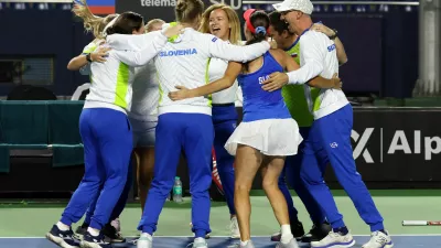 Slovenia team members celebrate Kaja Juvan Slovenia Match win during 2nd Match of 2025 Billie jean king cup play-off between the India vs Netherlands vs Slovenia held at the s.m. Krishna tennis stadium in Bangalore, India on the 15th November 2025Slovenija, tenis, Indija, pokal Billie Jean King, slavjePhoto by Rahul Goyal / ITF for the BJKCUP 