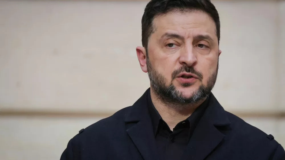 Ukraine's President Volodymyr Zelensky delivers a speech during a joint press conference with France's President Emmanuel Macron, in Paris, March 13, 2026. LUDOVIC MARIN/Pool via REUTERS