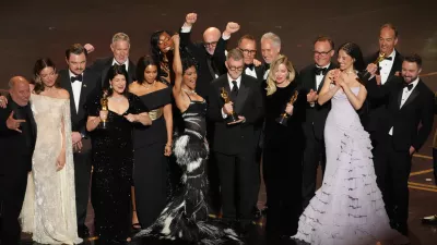 Jose Antonio Garcia, from left, Florencia Martin, Leonardo DiCaprio, Cassandra Kulukundis, Regina Hall, Shayna McHale, Teyana Taylor, Michael Bauman, Paul Thomas Anderson, Anthony Carlino, Will Weike, Sara Murphy, Chase Infiniti, Christopher Scarabosio, and Andy Jurgensen accept the award for best picture award for "One Battle After Another" during the Oscars on Sunday, March 15, 2026, at the Dolby Theatre in Los Angeles. (AP Photo/Chris Pizzello)