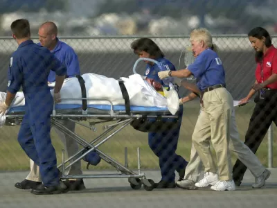 Actor Jason Priestley is removed from the infield hospital to an awaiting helicopter after crashing his Infinity Pro Series car during a practice session for the Kentucky 100, Sunday, Aug. 11, 2002, at the Kentucky Speedway in Sparta, Ky. IRL officials describes his injuries as serious. Priestley, a former star of the "Beverly Hills 90210" television series, was flown by helicopter to the University of Kentucky Medical Center in Lexington. (AP Photo/Ed Reinke)