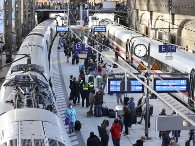 "Stay train" is written on display boards at Hamburg Central Station after long-distance traffic in northern Germany came to a standstill in Hamburg, Germany, Saturday, Oct.8, 2022. According to Deutsche Bahn, a technical malfunction is currently causing a complete standstill in long-distance traffic in northern Germany. All ICE as well as IC and EC trains in northern Germany are affected, Deutsche Bahn announced on Saturday morning. (Bodo Marks/dpa via AP)