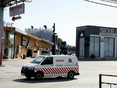 An ambulance in front of an Amana gas station in the aftermath of a strike, following an escalation between Hezbollah and Israel amid the U.S.-Israeli conflict with Iran, in Al Hosh, Tyre, Lebanon, March 18, 2026. REUTERS/ Amr Abdallah Dalsh