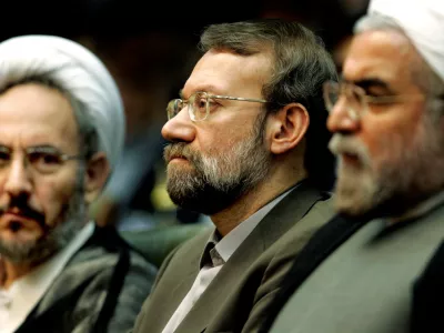 FILE PHOTO: Iran's former Intelligence Minister Ali Younesi (L), chief nuclear negotiator Ali Larijani and former chief nuclear negotiator Hassan Rouhani (R) attend a conference on Iran's Nuclear Policies and Prospects in Tehran April 25, 2006. REUTERS/Raheb Homavandi/File Photo