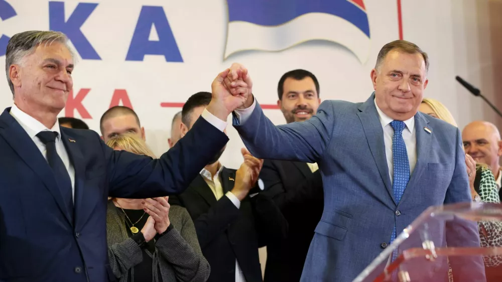 Milorad Dodik, former President of the Bosnian Serb Republic, and Sinisa Karan attend a press conference after preliminary results indicated Karan won a snap presidential election in Banja Luka, Bosnia and Herzegovina, November 23, 2025. REUTERS/Amel Emric