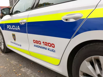 Kranj, Slovenia - October 21, 2022: Slovenian police patrol car parked in front of the police station in Kranje.. Police car with the lettering "Policija".