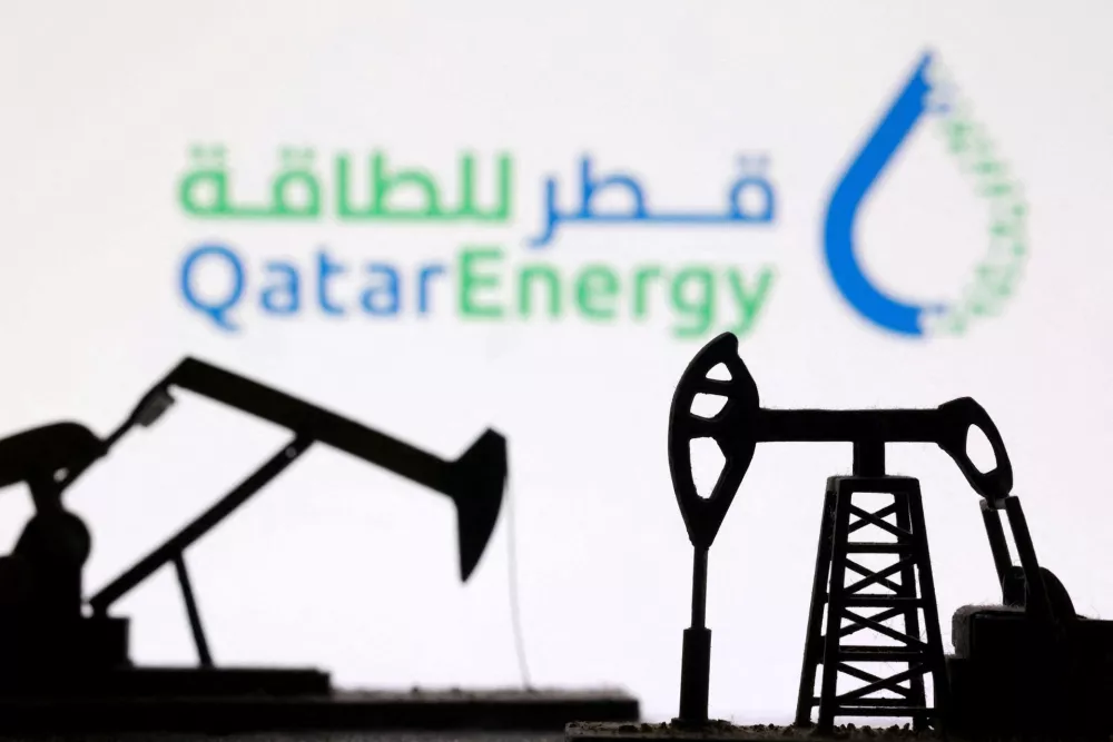 FILE PHOTO: 3D-printed oil pump jacks and the QatarEnergy logo appear in this illustration taken March 2, 2026. REUTERS/Dado Ruvic/Illustration/File Photo