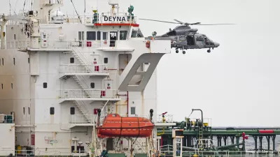 A French Navy helicopter hovers over the Deyna vessel, which is supposed to be a member of the Russian shadow fleet, during an operation in the Western Mediterranean Sea, in this handout image obtained by Reuters on March 20, 2026. Prefecture maritime de la Mediterranee/Etat Major des Armees/Handout via REUTERS  THIS IMAGE HAS BEEN SUPPLIED BY A THIRD PARTY