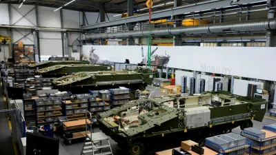 FILE PHOTO: Lynx fighting vehicles are pictured at a production line at the plant of German company Rheinmetall, which produces weapons and ammunition for tanks and artillery, during a media tour in Unterluess, Germany, June 6, 2023. REUTERS/Fabian Bimmer/File Photo