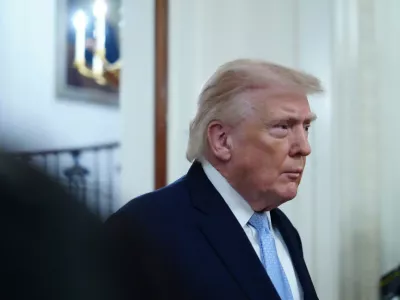 President Donald Trump arriving to speak at the Commander-in-Chief's Trophy presentation with the Navy Midshipmen football team in the East Room of the White House, Friday, March 20, 2026, in Washington. (AP Photo/Julia Demaree Nikhinson)