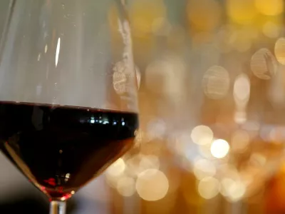 FILE PHOTO: A glass of French red wine is displayed at the Chateau du Pavillon in Sainte-Croix-Du-Mont, France, July 29, 2019. REUTERS/Regis Duvignau/File Photo