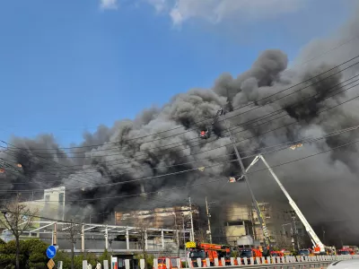 Black smoke rises from an auto parts plant in Daejeon, South Korea, Friday, March 20, 2026. (Kim So-yeon/Yonhap via AP)