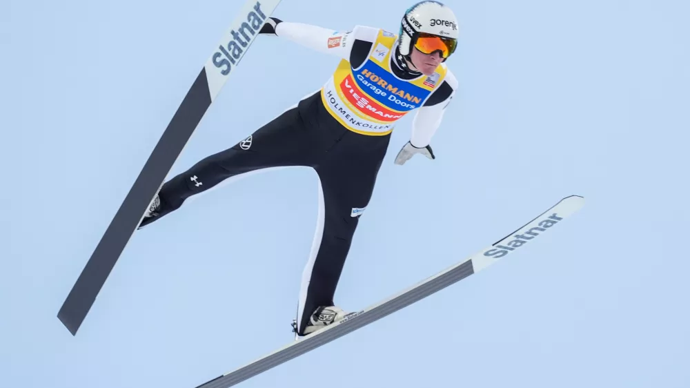 Domen Prevc from Slovenia competes in the men's large hill jump in the World Cup in Holmenkollen, outskirts of Oslo, Norway, Saturday, March 14, 2026. (Terje Pedersen/NTB Scanpix via AP)