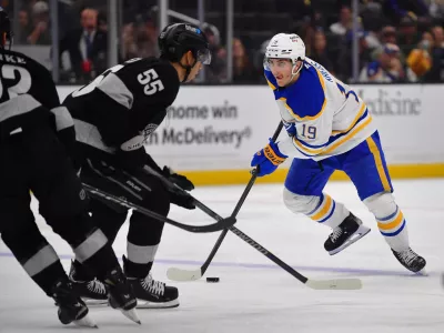 Mar 21, 2026; Los Angeles, California, USA; Buffalo Sabres center Peyton Krebs (19) moves the puck against the Los Angeles Kings during the third period at Crypto.com Arena. Mandatory Credit: Gary A. Vasquez-Imagn Images