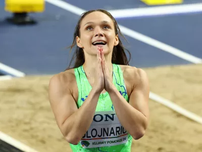 Athletics - World Indoor Championships - Kujawsko-Pomorska Arena, Torun, Poland - March 22, 2026 Slovenia's Nika Glojnaric celebrates after placing third in heat 6 of the women's 60m hurdles REUTERS/Bernadett Szabo