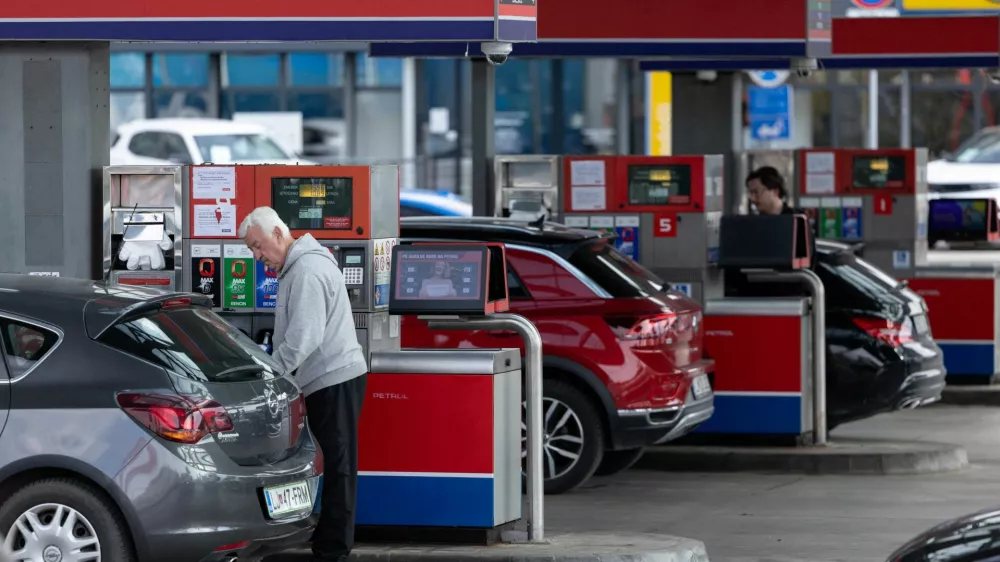 A man refills fuel in his car at a petrol station in Ljubljana, Slovenia, March 22, 2026. REUTERS/Antonio Bronic