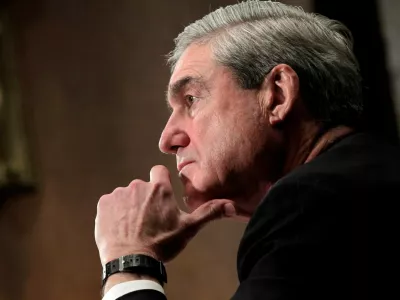 FILE - FBI Director Robert S. Mueller III pauses while testifying before the Senate Judiciary Committee hearing on FBI oversight, Capitol Hill in Washington, Dec. 14, 2011. Mueller died on Friday, March 20, 2026. He was 81. (AP Photo/J. Scott Applewhite, File)