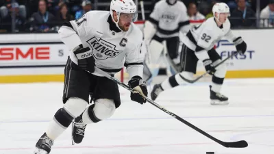 Mar 22, 2026; Salt Lake City, Utah, USA; Los Angeles Kings center Anze Kopitar (11) skates with the puck against Utah Mammoth during the second period at Delta Center. Mandatory Credit: Rob Gray-Imagn Images