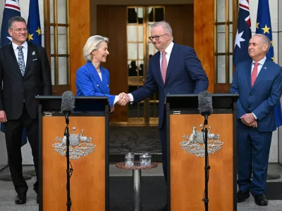 Australian Prime Minister Anthony Albanese and President of the European Commission Ursula von der Leyen shake hands during a press conference at Parliament House in Canberra, Australia, March 24, 2026. Lukas Coch/AAP/via REUTERS  ATTENTION EDITORS - THIS IMAGE WAS PROVIDED BY A THIRD PARTY. NO RESALES. NO ARCHIVE. AUSTRALIA OUT. NEW ZEALAND OUT. NO COMMERCIAL OR EDITORIAL SALES IN NEW ZEALAND. NO COMMERCIAL OR EDITORIAL SALES IN AUSTRALIA.
