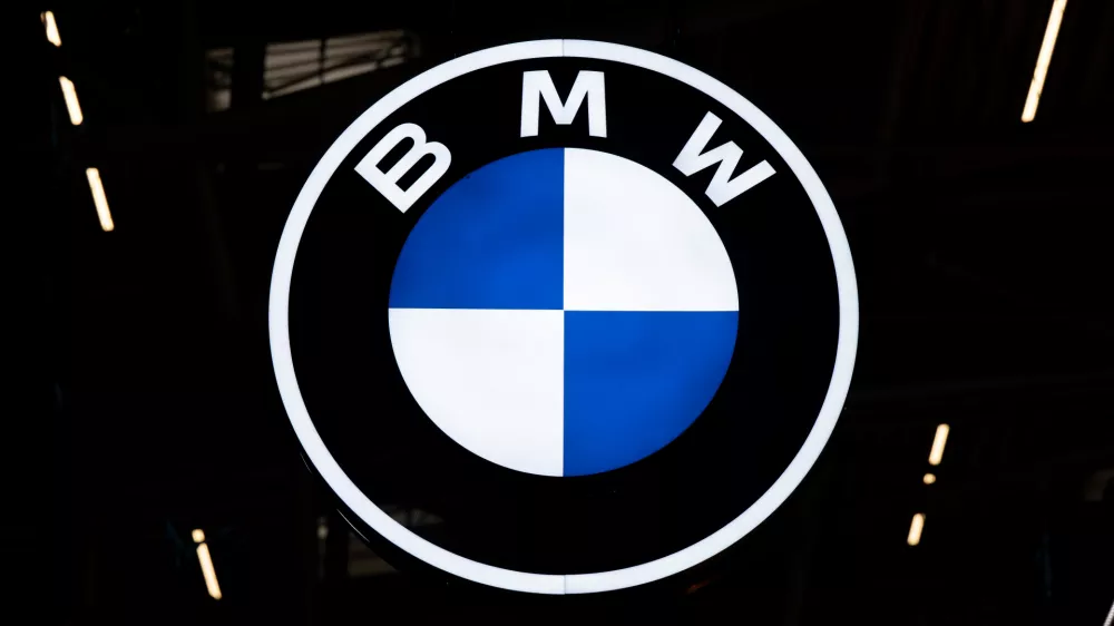 FILED - 10 September 2025, Bavaria, Munich: The BMW logo at the BMW booth during the International Motor Show (IAA Mobility). BMW is recalling hundreds of thousands of vehicles worldwide over a technical fault that could cause the cars to catch fire, the luxury carmaker said on Wednesday. Photo: Sven Hoppe/dpa