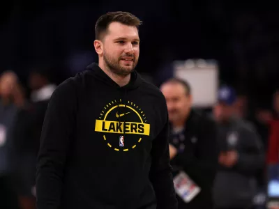 Jan 13, 2026; Los Angeles, California, USA; Los Angeles Lakers guard Luka Doncic (77) warms up before the game against the Atlanta Hawks at Crypto.com Arena. Mandatory Credit: Kiyoshi Mio-Imagn Images