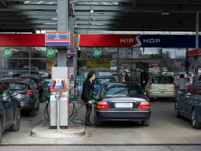 A man refills fuel in his car at a petrol station in Ljubljana, Slovenia, March 22, 2026. REUTERS/Antonio Bronic