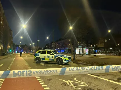 A Swedish police car stands near the site where a bus hit a bus stop in central Stockholm, Sweden, November 14, 2025. REUTERS/Marie Mannes