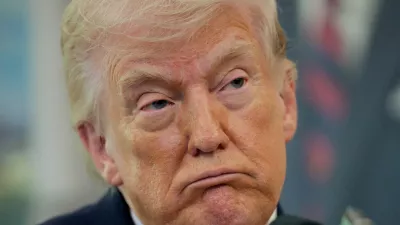 U.S. President Donald Trump looks on as he attends Markwayne Mullin's swearing-in as Department of Homeland Security (DHS) Secretary, at the White House in Washington, D.C., U.S., March 24, 2026. REUTERS/Evan Vucci