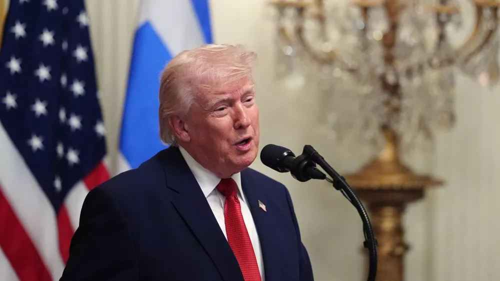 President Donald Trump speaks at a reception celebrating Greek Independence Day, in the East Room of the White House, Thursday, March 26, 2026, in Washington. (AP Photo/Julia Demaree Nikhinson)