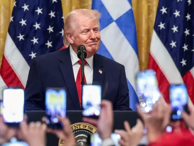 U.S. President Donald Trump attends a celebration in honor of Greek Independence Day in the East Room of the White House in Washington, D.C., U.S., March 26, 2026. REUTERS/Evelyn Hockstein
